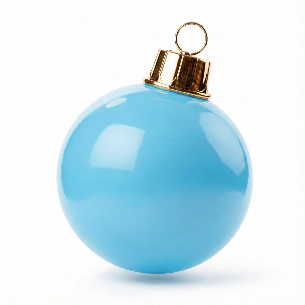 Blue Christmas ornament with gold cap on a white background